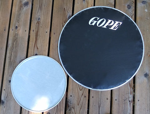 Napa drum surdo head. Front side of and back side of head shown. GOPE logo.