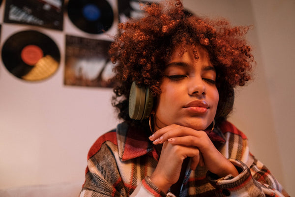 A relaxed woman listening to music