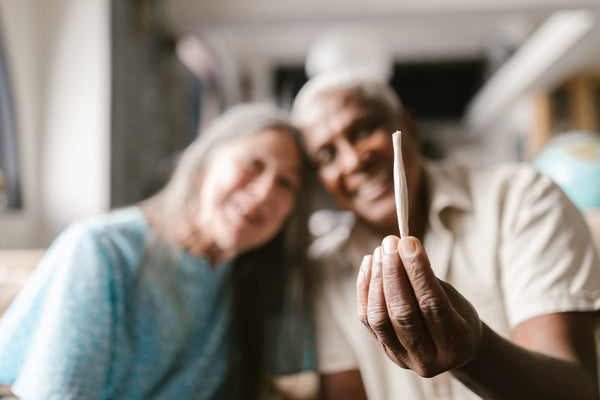 An older couple looking at a joint
