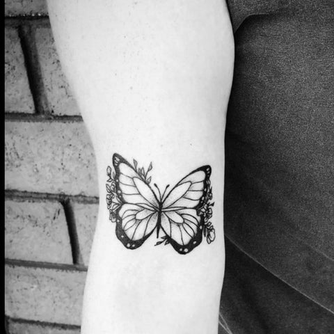 butterfly tattoo on side designs