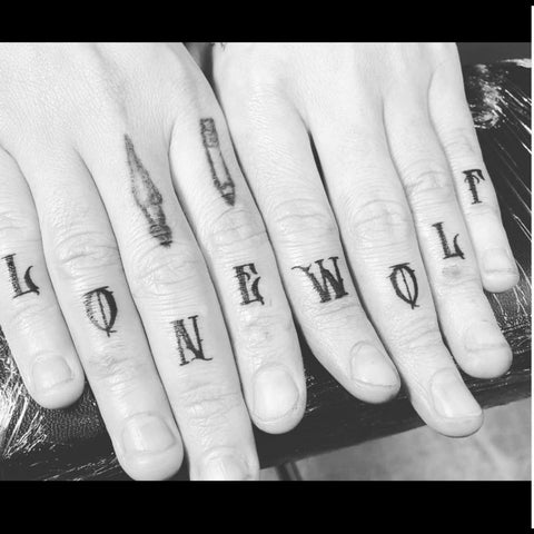 Lone Wolf finger Tattoos Best Valentine’s Day Tattoo Ideas