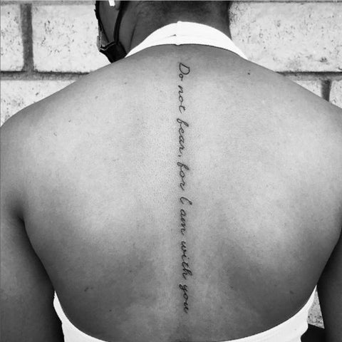 spine tattoos writing