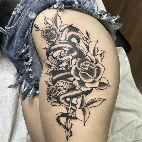 Snake with Roses on Hip Tattoo Best Snake Tattoo Ideas