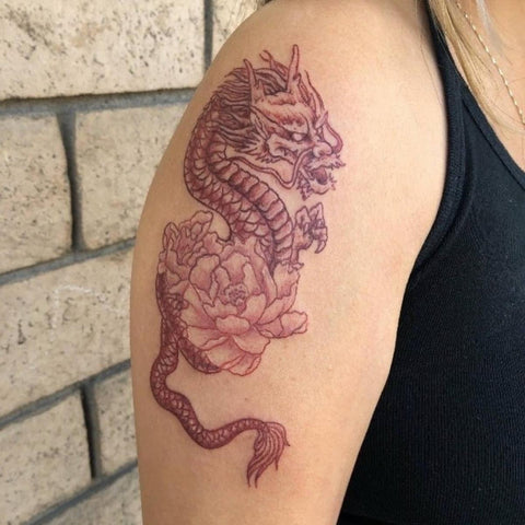 Dragon with flowers tattoo  Dragon tattoo for women Tattoos Dragon tattoo