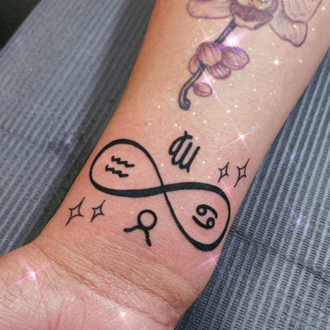 Tattoo uploaded by Nicoleta Andreea  Infinity sign made from stars and  names  Tattoodo