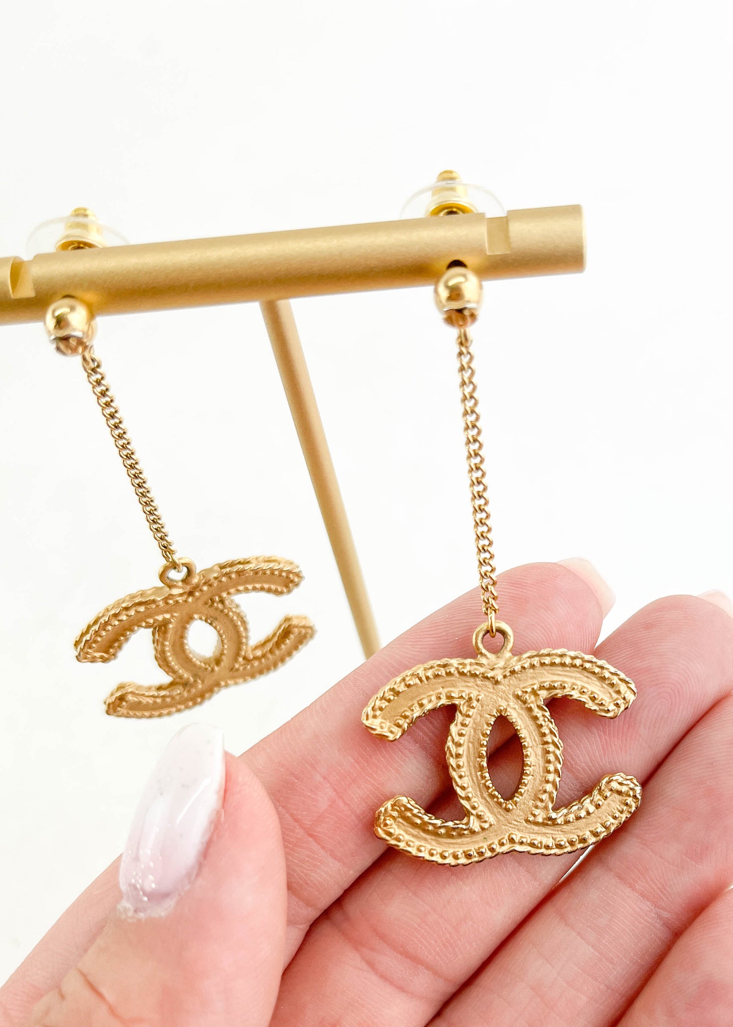 Chanel CC Gold Tone Clipon Dangle Earrings For Sale at 1stDibs  chanel  dangle earrings gold chanel earrings gold gold chanel earrings