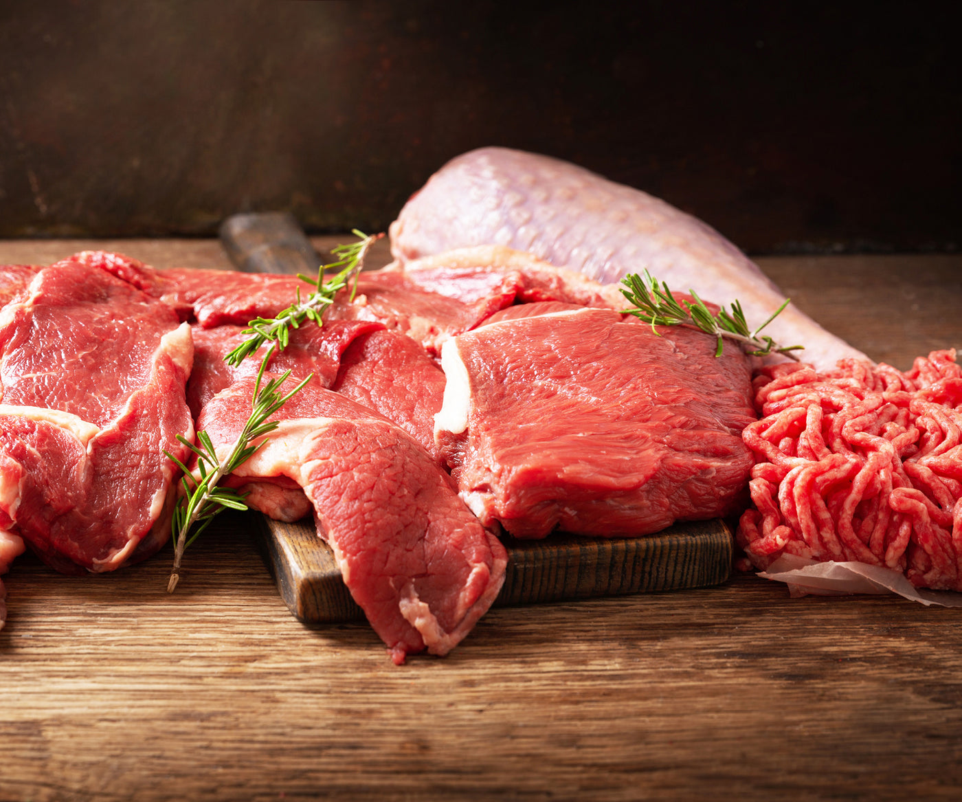 Meat cutting. Raw meat. Meat 87584. Meat Board. Raw Fish meat on Brown chopping Board.