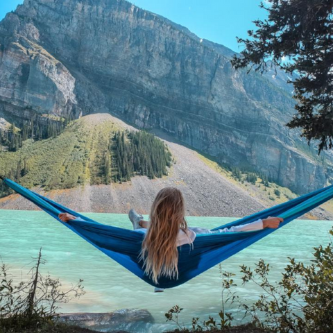 girl in blue travel hammock