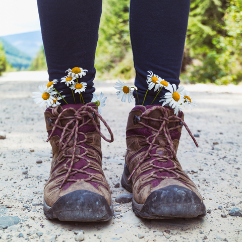 hiking boots with flowers in them 