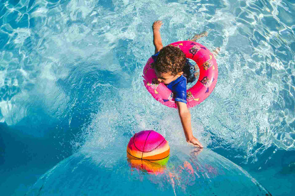 Kid swimming in inflatable tube