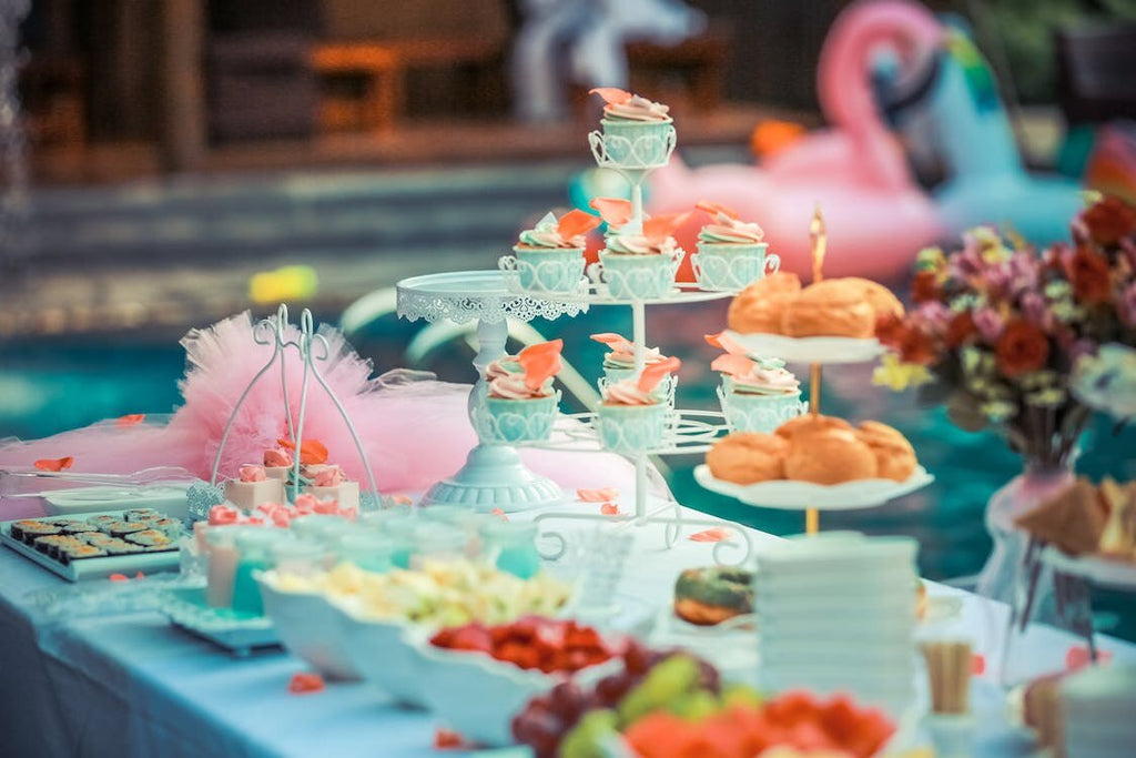 A table set with tea party-style appetizers