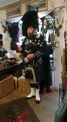 A Piper during a GNK Tartan Talk at 189 Canongate