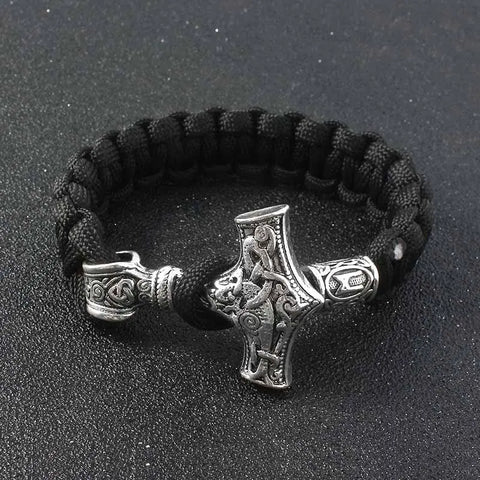 https://cdn.shopify.com/s/files/1/0084/8488/0447/files/Thor_s-Might---Large-Paracord-Mjolnir-Bracelet-Viking-Bracelet-for-Men-Thor_s-Hammer-Bracelet-Norse-Viking-Jewelry-Wicked-Tender-1671035235_480x480.webp?v=1671035861