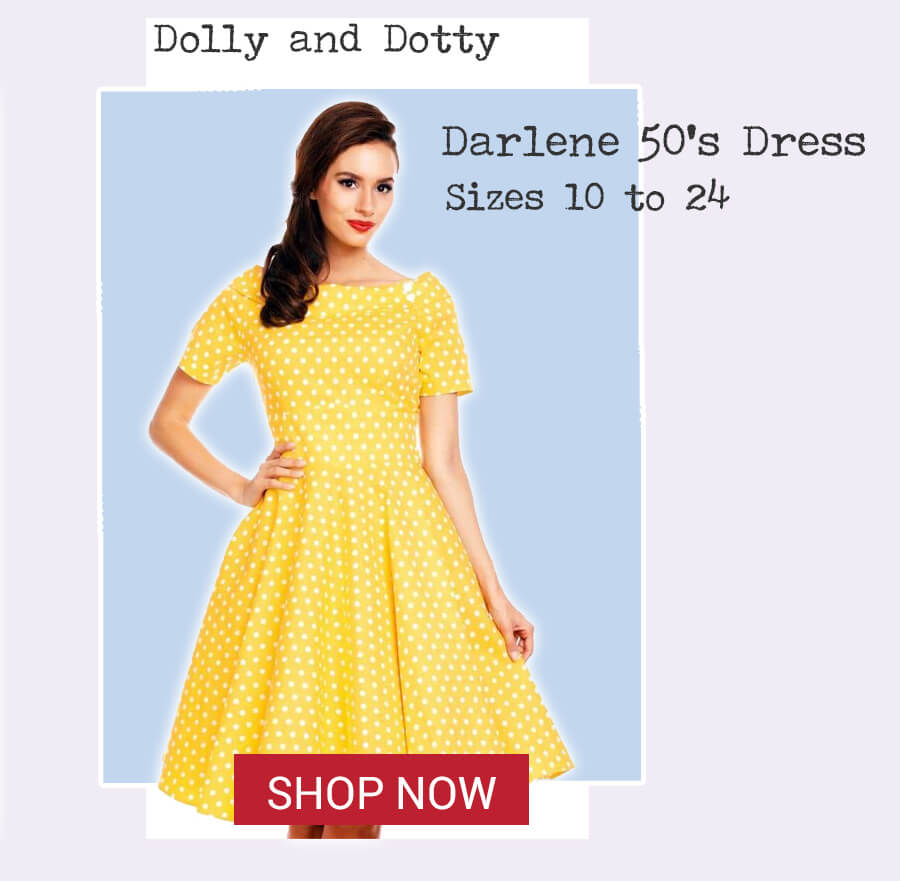 Image of model wearing Dolly and Dotty Darlene dress - yellow polka dot