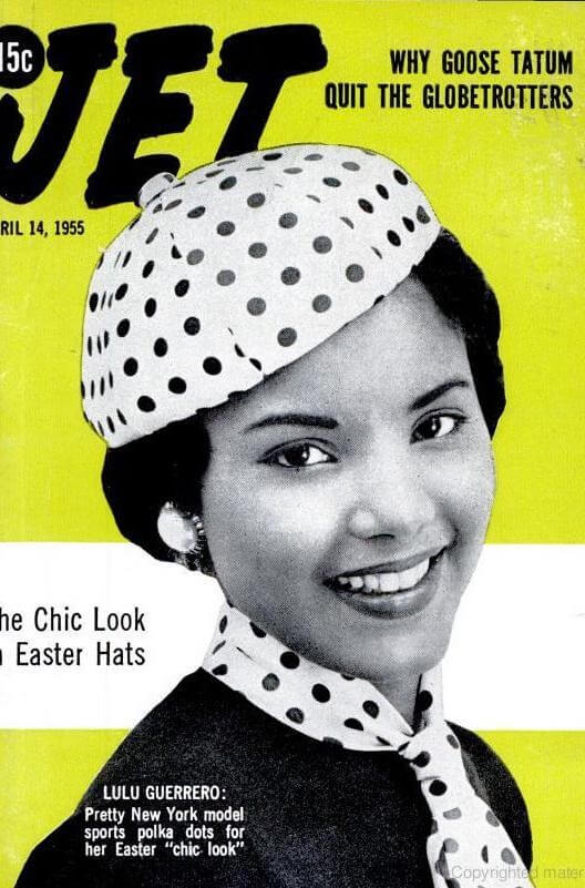 Retro image of Lulu Guerrero  in matching polka dot hat and scarf