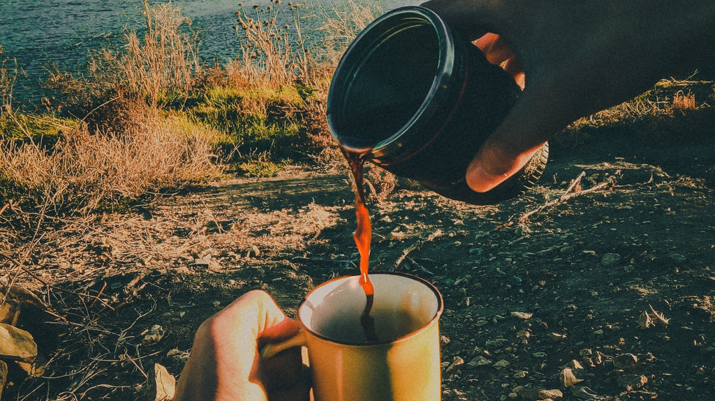 Pouring coffee while backpacking