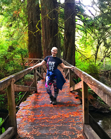 Mountain House Ambassador Crystal Carrol on trail bridge