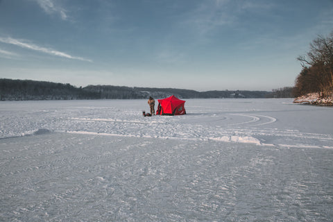 Person ice fishing at Devils Lake.