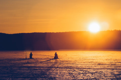 Men ice fishing at Lake Erie.