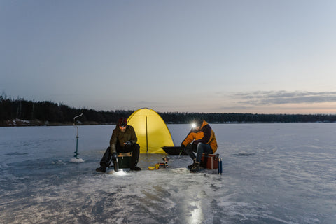 Men ice fishing at Lake Winnebago.