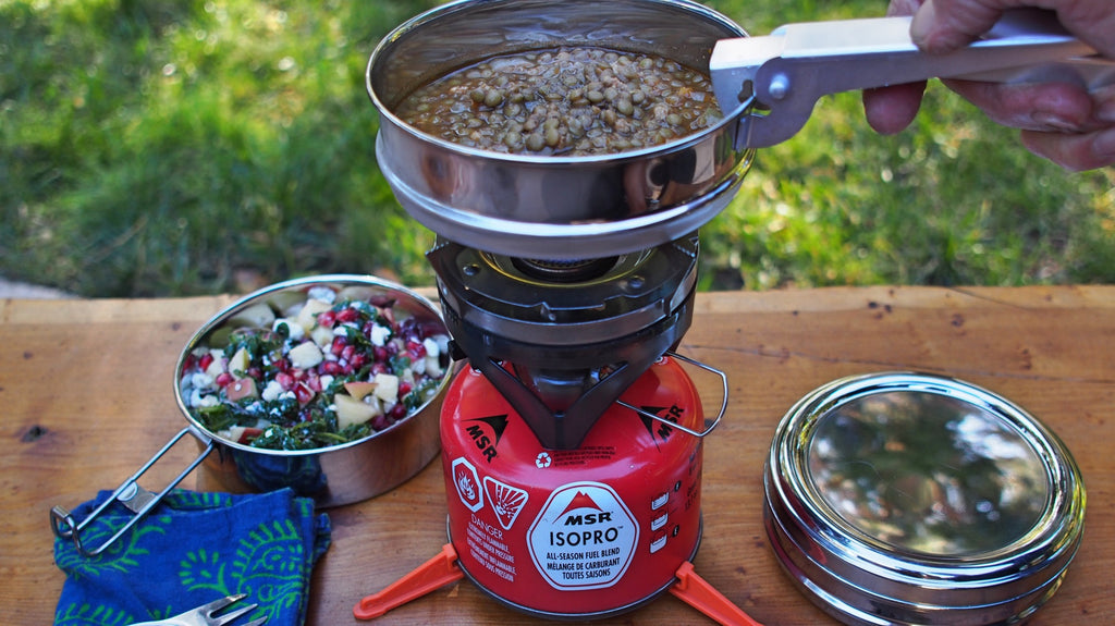 Lentils cooking on a backpacking stove