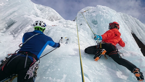 Pair of ice climbers during mid-climb.