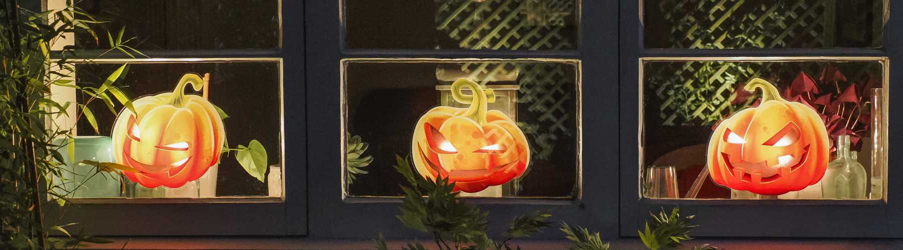 Using Halloween window stickers as spooky window decorations