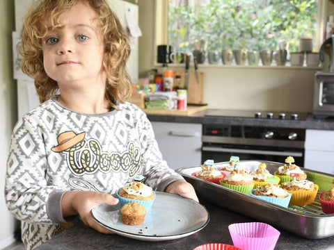 Kids baking muffins