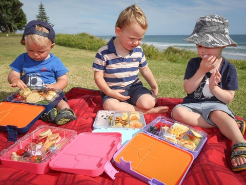 Kids lunchboxes outdoors