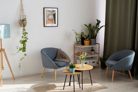 Wooden stools as plant stands