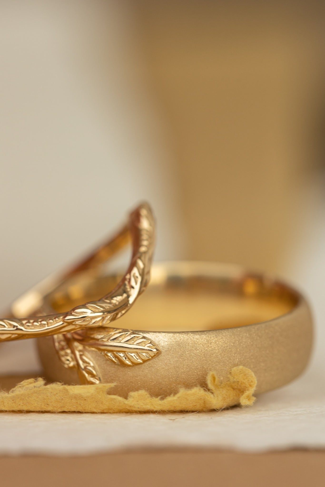 Wedding rings set for couples: satin band with branch for him, curved leaf  ring with gemstones for her