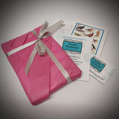 Sustainable gift wrapping of pleated pink tissue paper and grey ribbon - Parade Handmae