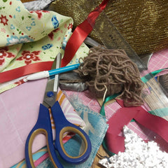 a Collection of Colourful Materials Gathered from around the House for Making Gift Bags and Tags - Parade Handmade