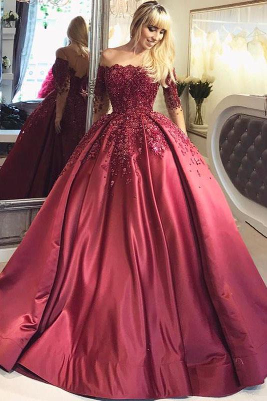 red lace gown with sleeves