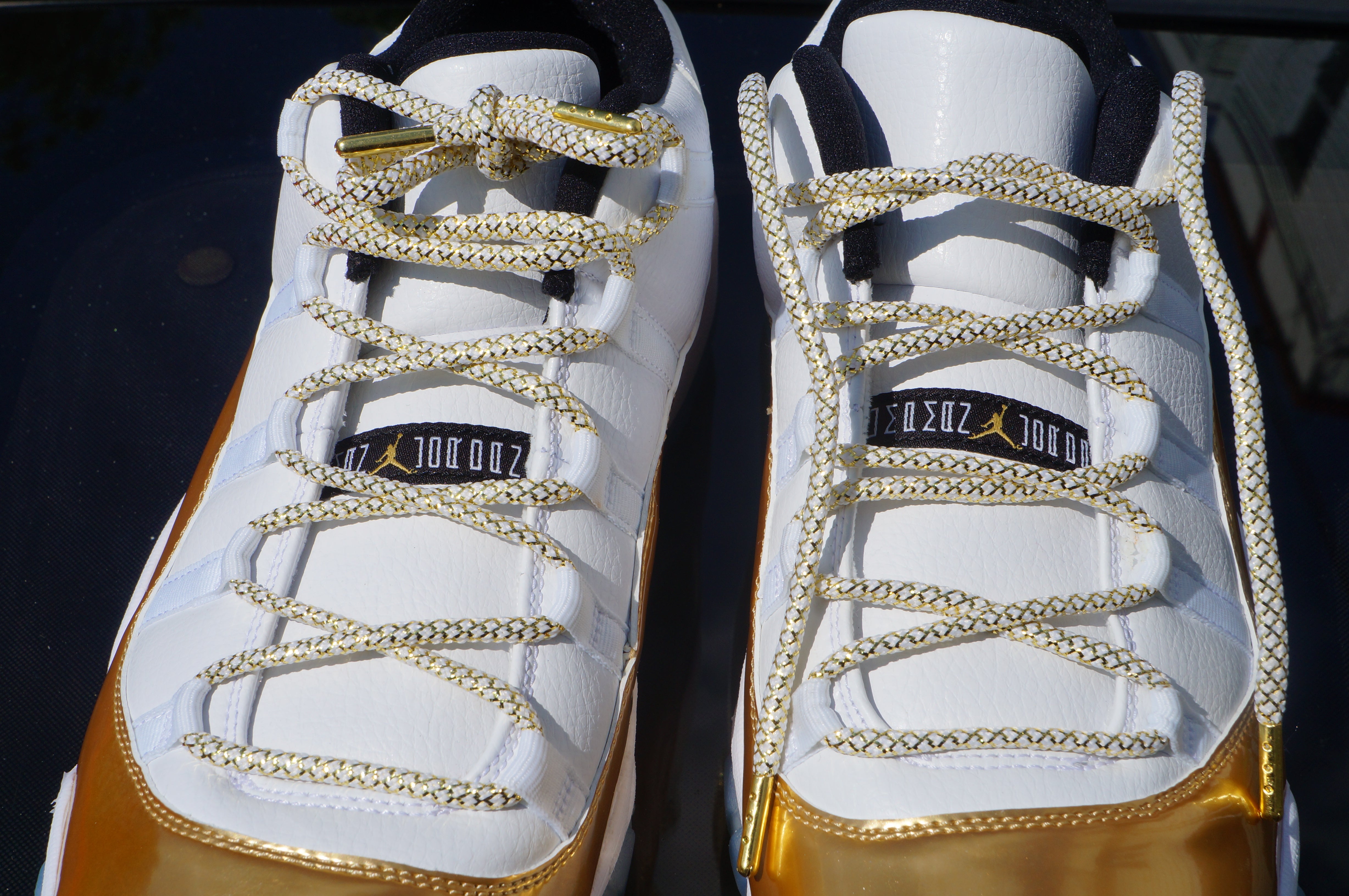white and gold shoelaces