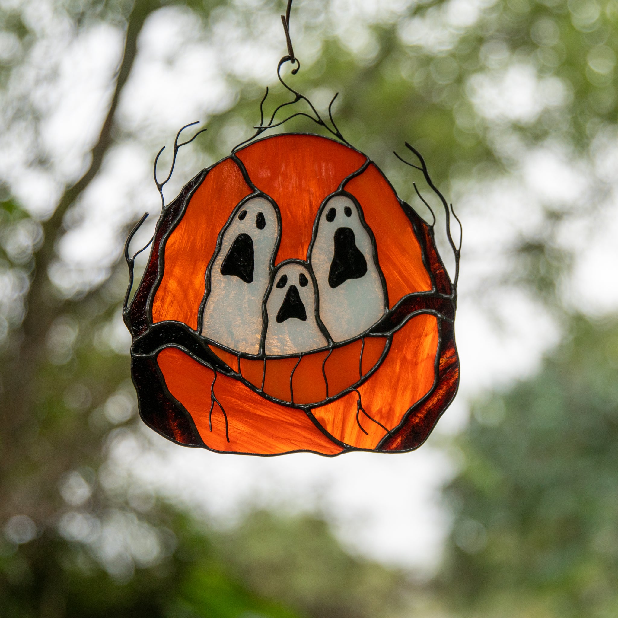 Halloween stained glass ghost-eyed pumpkin for creepy Halloween decor