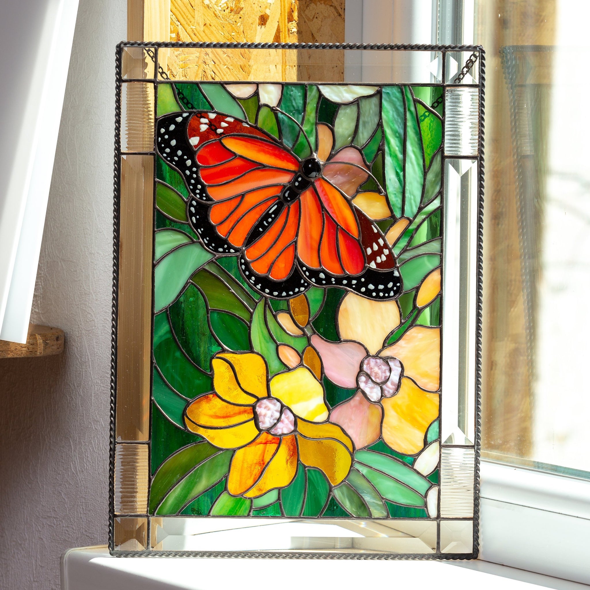 Stained glass monarch butterfly with orchids panel for window