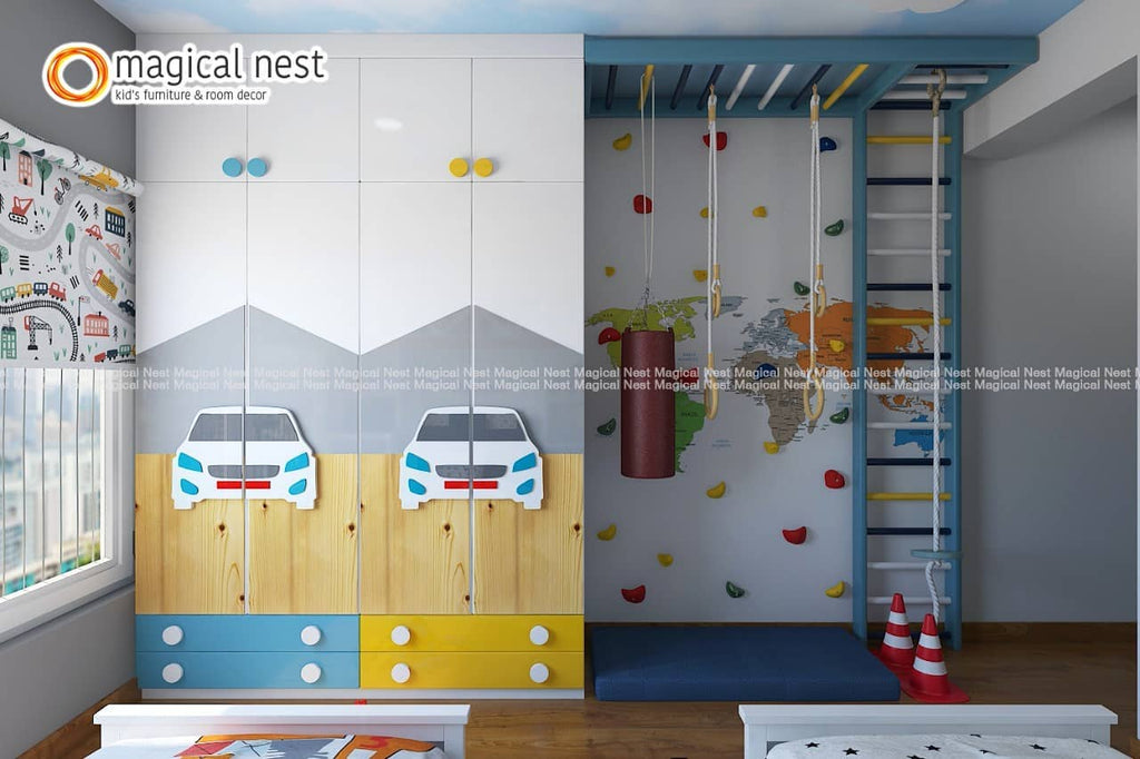 The activity area in the kid’s room. Wall-climbing with colorful rocks, ropes, and ladders for the playful kids