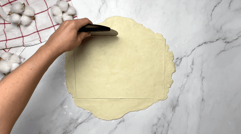 Cutting cookie dough into rectangle shape