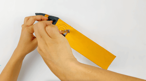 Using a compass to make a clock on the cardboard big ben clock tower