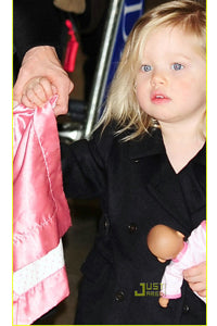 Shiloh Jolie Pitt with Baby Lovie