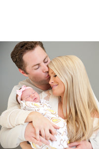 Jay and Erica McGraw with Ultimate Swaddle Blanket
