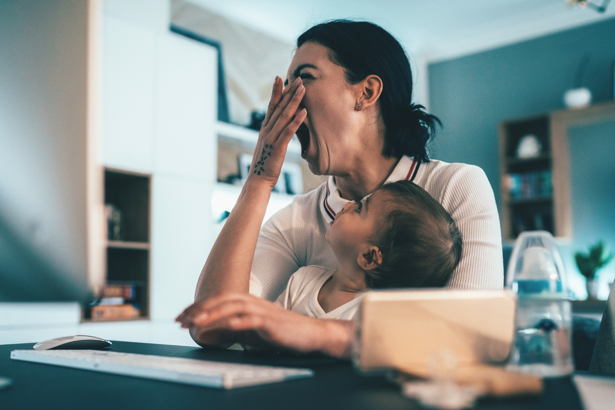 tired woman with baby