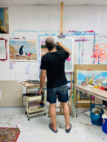 Alexander Grahovsky works on his latest painting in studio.