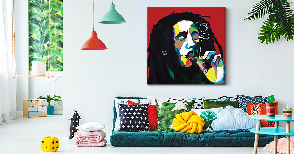 Image of Bob Marley on a living room wall with a couch and other decors.
