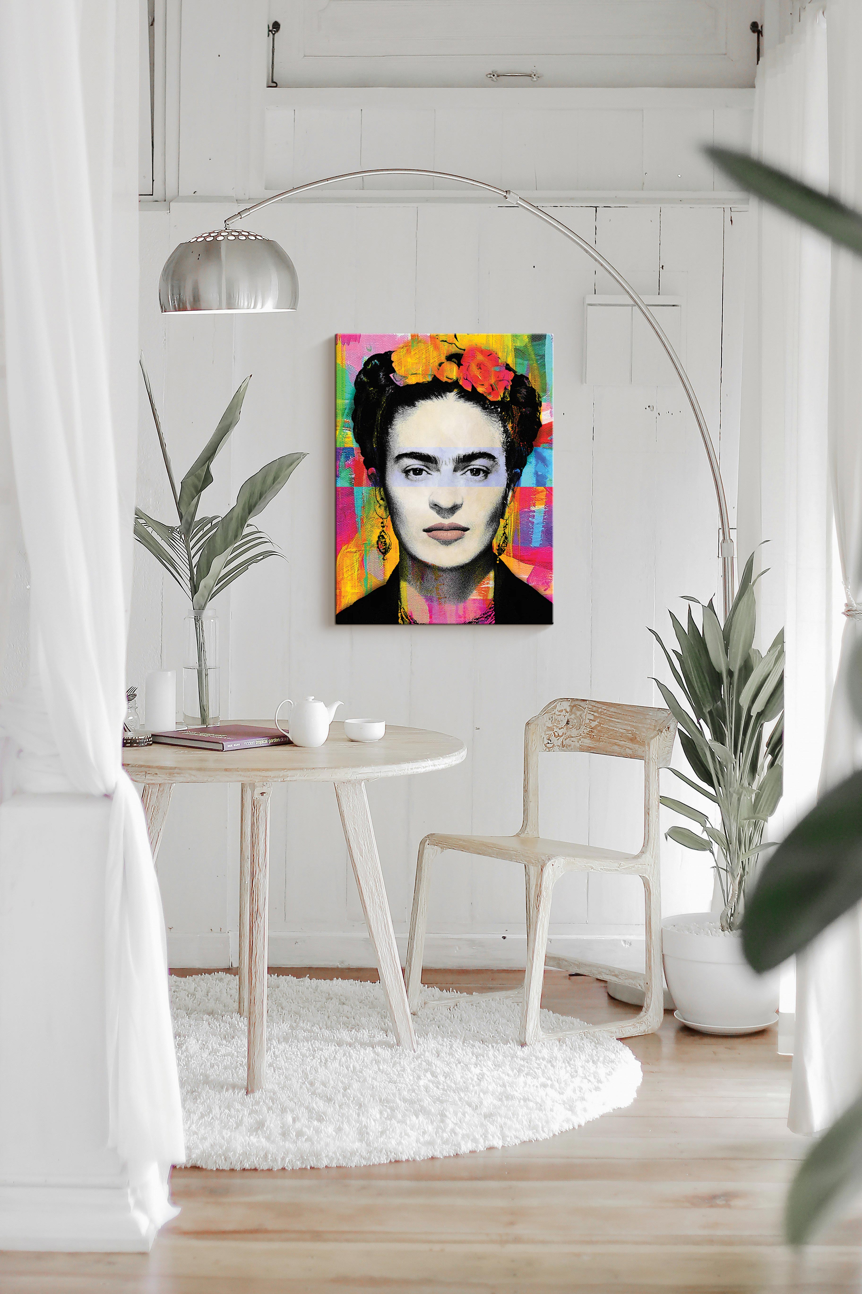 Inspired by Frida Canvas Print hanging on a sitting room wall.