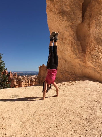 Bright Winter Deb French in yoga pose on world travels