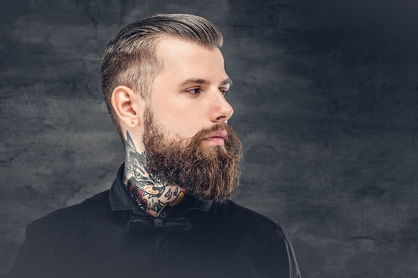 man with beard and tattoo on neck