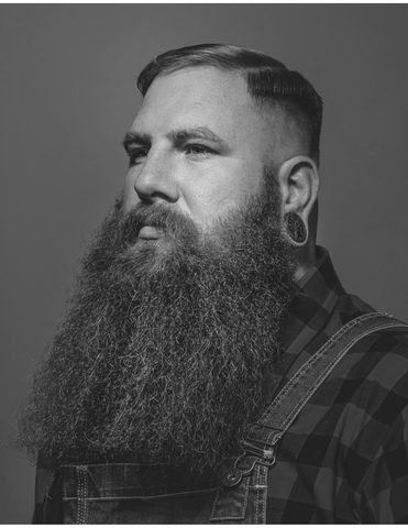 Long bearded man with mid fade haircut