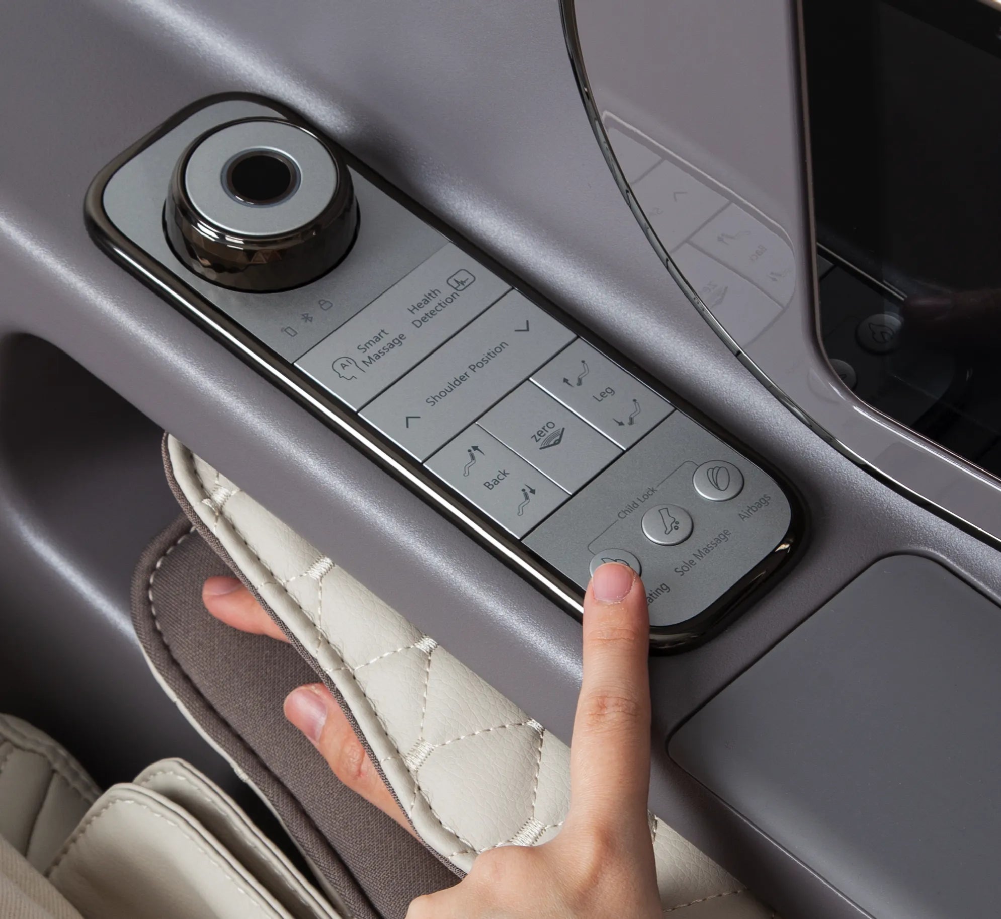 a hand pressing a button on a car door